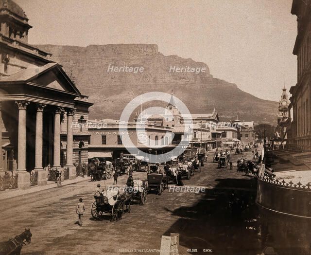 Cape Town, South Africa: horses and carriages on Adderley Street, with Table Mountain..., 1896. Creator: George Washington Wilson.