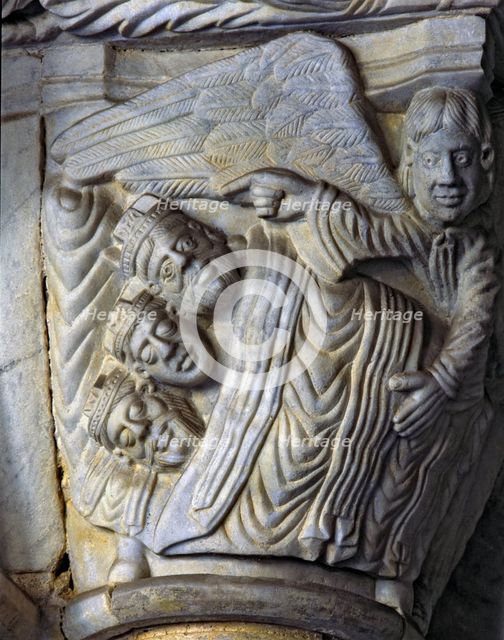Capital in the left part of the Cloister of the Cathedral of Tarragona representing the Magi lyin…