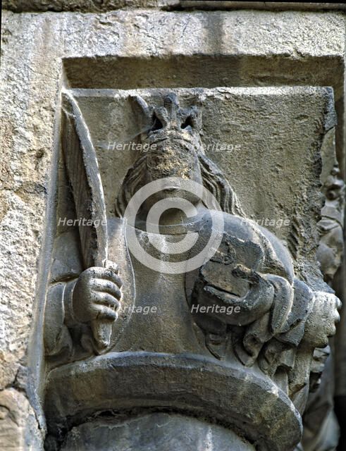 Capital of one of the Gothic galleries of the cloister built between (1387 - 1401) representing a…