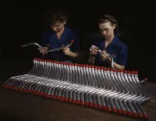 Capping and inspecting tubing: two women are shown...at Vultee's Nashville division, Tennessee, 1943 Creator: Alfred T Palmer
