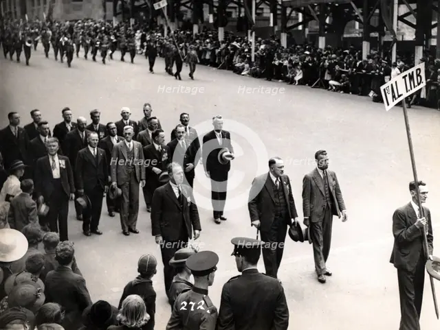 Capt Frank Page MC (with walking stick), Anzac Day march, year unknown. Creator: Unknown.
