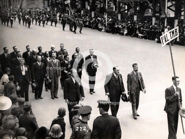 Capt Frank Page MC (with walking stick), Anzac Day march, year unknown. Creator: Unknown.