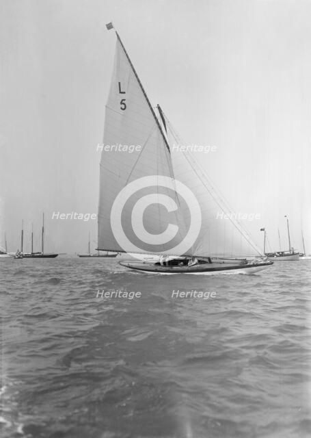 Capt R J Dixon winning the 6 Metre race in 'Jonquil'. Creator: Kirk & Sons of Cowes.