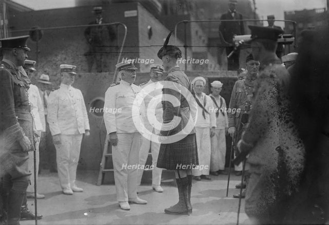Captain Adams receiving "Kilties" on U.S.S. Recruit, July 1917. Creator: Bain News Service.