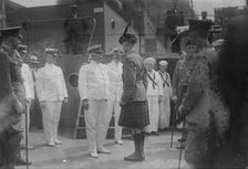 Captain Adams receiving "Kilties" on U.S.S. Recruit, July 1917. Creator: Bain News Service