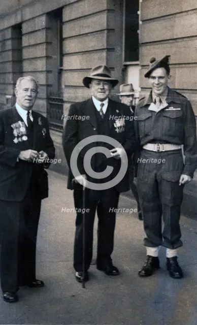 Captain Frank Page MC (centre), Anzac Day march, year unknown. Creator: Unknown.