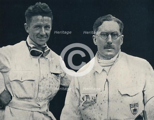 'Captain G. E. T. Eyston and assistant', 1937. Artist: Unknown.