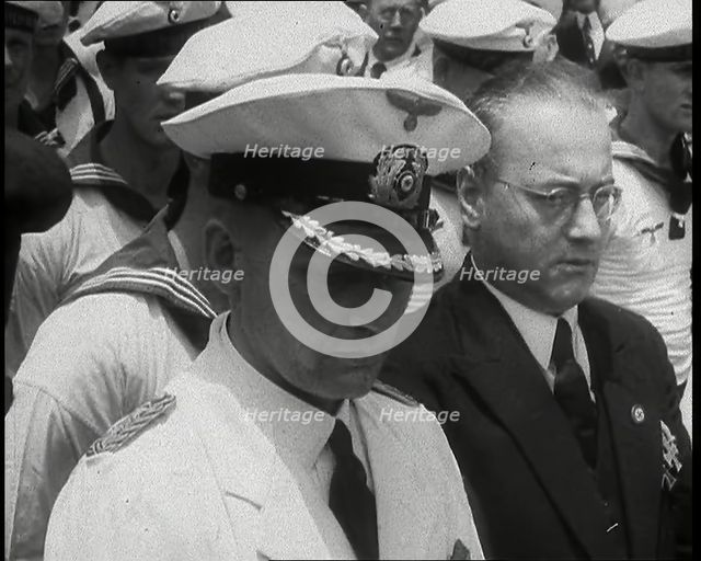 Captain Hans Langdorff of the German Battleship the Graf Spee at tending a Funeral of..., 1939. Creator: British Pathe Ltd.