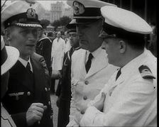 Captain Hans Langsdorff of the German Battleship Graf Spee Talking With Other Naval Officers, 1939. Creator: British Pathe Ltd