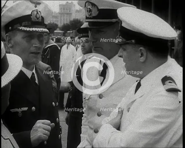 Captain Hans Langsdorff of the German Battleship Graf Spee Talking With Other Naval Officers, 1939. Creator: British Pathe Ltd.