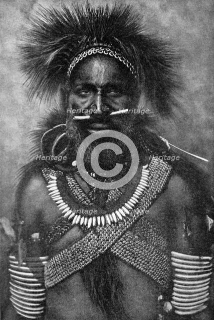 'Captain of a company of cannibal fighting men, New Guinea', 1922. Artist: Unknown
