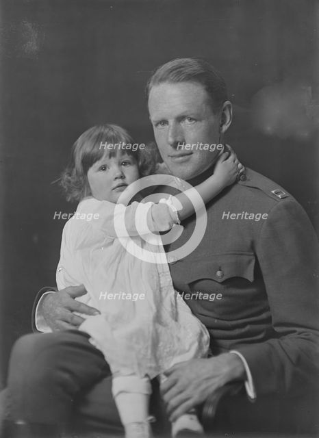 Captain Rainsforth and baby, portrait photograph, 1918 Oct. 21. Creator: Arnold Genthe.