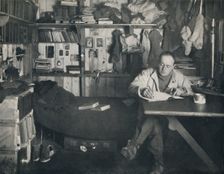 Captain Scott Writing His Diary in the Hut at Cape Evans c1911, (1914). Creator: Herbert Ponting
