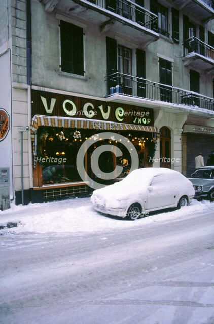 Car covered in snow in French street. Artist: Unknown.