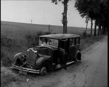 Car Crashed at the Side of the Road in the French Third Republic, 1940. Creator: British Pathe Ltd