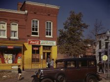 Car in front of Shulman's Market on N at Union St. S.W., Washington, D.C., between 1941 and 1942. Creator: Louise Rosskam