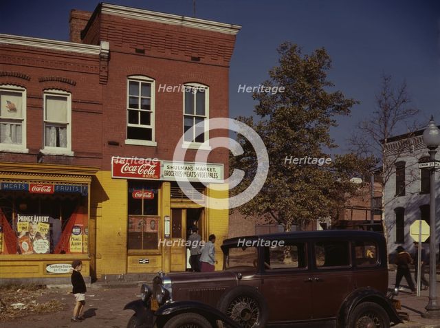 Car in front of Shulman's Market on N at Union St. S.W., Washington, D.C., between 1941 and 1942. Creator: Louise Rosskam.