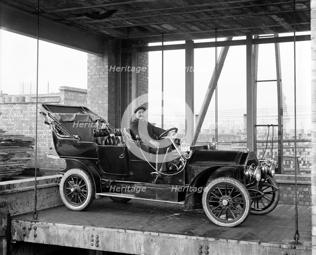 Car lift at Mitchell Motors Company, 114 Wardour Street, Westminster, London, 1907. Artist: Bedford Lemere and Company.