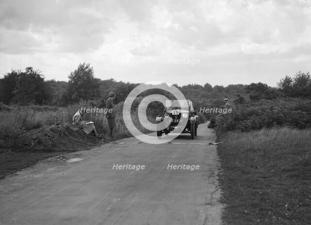 Car taking part in a First Aid Nursing Yeomanry trial or rally, 1931. Artist: Bill Brunell.