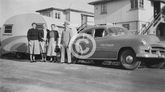 Car with caravan, Mooloolaba, Queensland, 1952. Creator: Jack Bain.