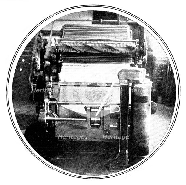 Carding, which transforms the lap into an untwisted strand, known as a sliver, 1909.  Creator: Unknown.