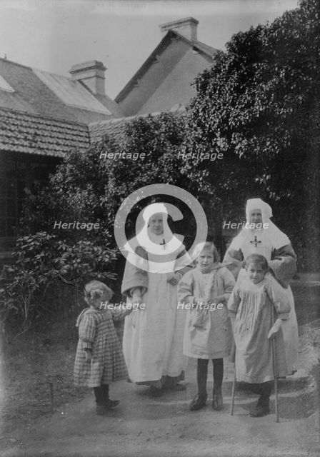 Caring for children, Quimper, 27 June 1918. Creator: Bain News Service.
