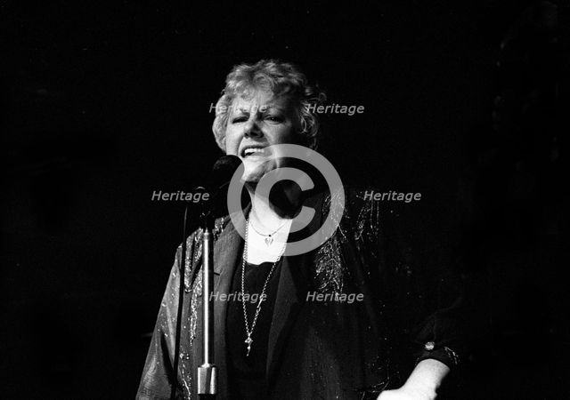 Carol Kidd, Pizza on the Park, London, April 1991. Artist: Brian O'Connor.
