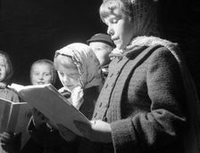 Carol singers, c1955. Creator: Arthur Charles Kirby Ware
