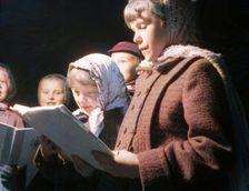 Carol singers, c1955. Creator: Arthur Charles Kirby Ware