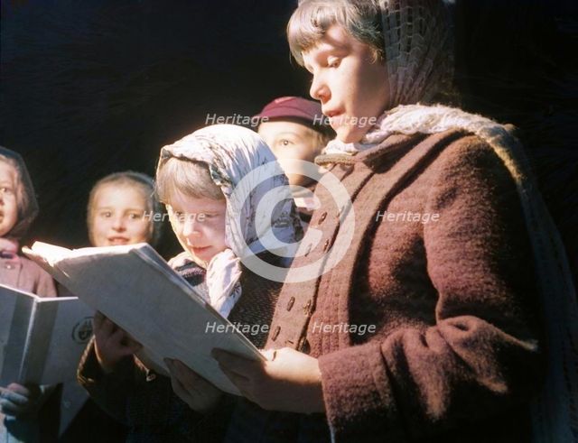 Carol singers, c1955. Creator: Arthur Charles Kirby Ware.
