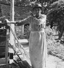 Caroline Atwater, wife of Negro owner, tells how they got their place, 1939. Creator: Dorothea Lange
