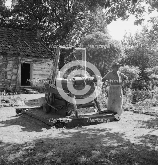 Caroline Atwater, wife of Negro owner, tells how they got their place, 1939. Creator: Dorothea Lange.