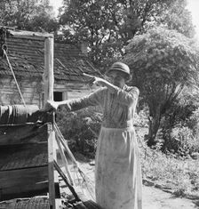 Caroline Atwater, wife of Negro owner, tells where she was born, 1939. Creator: Dorothea Lange