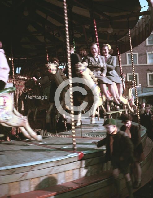 Carousel at a fair, c1955-1965. Creator: Arthur Charles Kirby Ware.