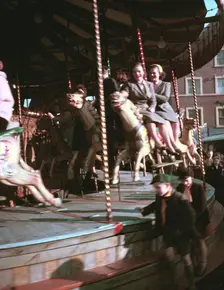 Carousel at a fair, c1955-1965. Creator: Arthur Charles Kirby Ware