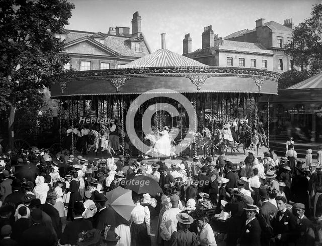 Carousel ride, St Giles Fair, Oxford, Oxfordshire, 1895. Creator: Henry Taunt.