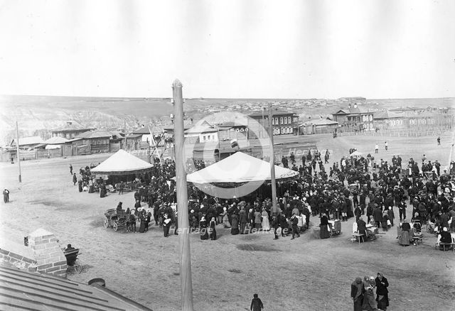 Carousels on Novobazarnaya Square, 1910-1919. Creator: N. A. Stavrovskii.