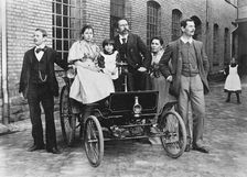 Carl Benz with his family at his Benz Velo in the Mannheim factory yard, 1894. Creator: Anonymous