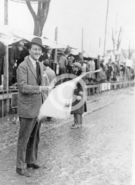 Carlo Masetti waving a flag. Artist: Unknown