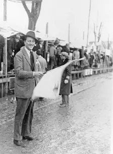 Carlo Masetti waving a flag