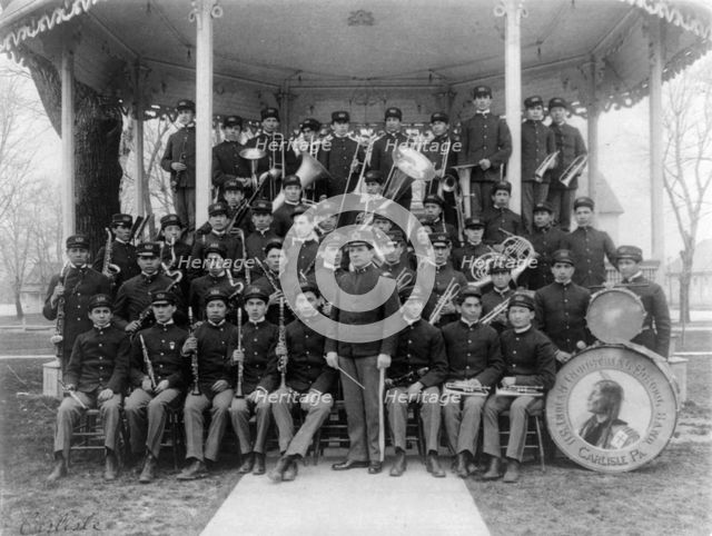Carlisle Indian School, Carlisle, Pa. Band posed at the bandstand, 1901. Creator: Frances Benjamin Johnston.