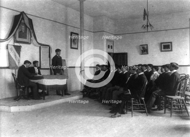 Carlisle Indian School, Carlisle, Pa. Classroom debate by debating society, 1901. Creator: Frances Benjamin Johnston.