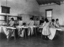 Carlisle Indian School, Carlisle, Pa. Ironing class, 1901. Creator: Frances Benjamin Johnston