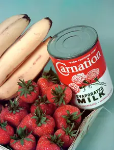 Carnation Evaporated Milk, c1955. Creator: Arthur Charles Kirby Ware