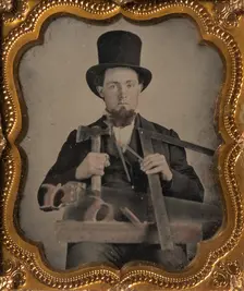 Carpenter in Top Hat with Hatchet, Compass, Square, and Hand Saw, 1850s-60s. Creator: Unknown