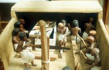 Carpenters in a workshop, model figures from an Ancient Egyptian tomb