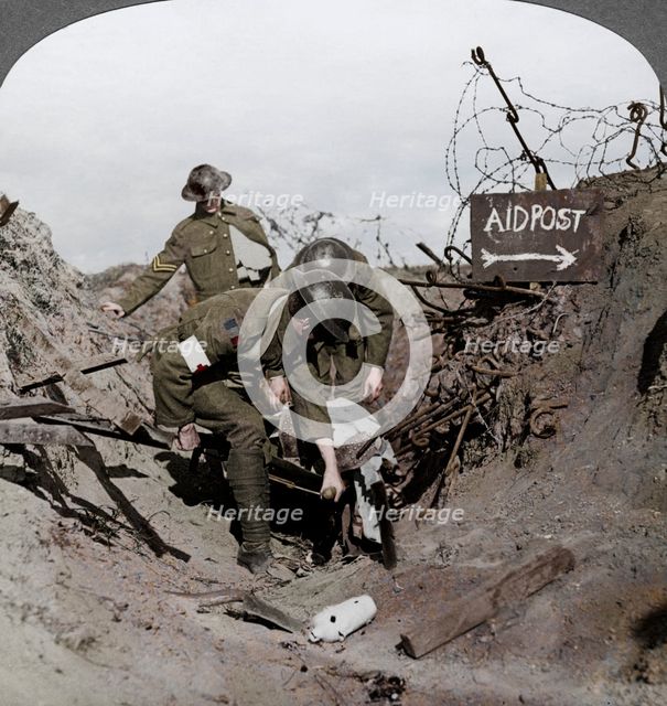 Carrying a wounded soldier to a first aid post, Passchendaele, Belgium, World War I, 1914-1918. Artist: Realistic Travels Publishers.