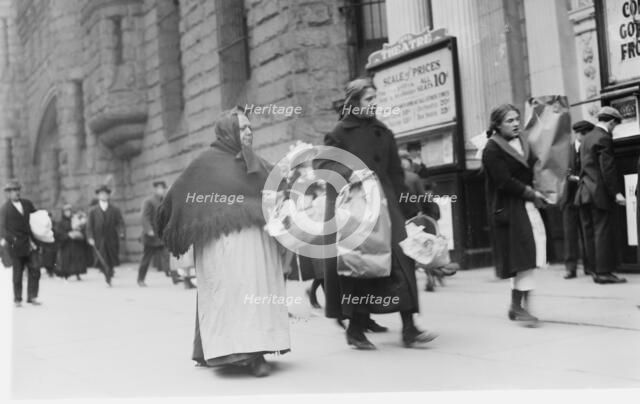 Carrying home Xmas baskets, between c1910 and c1915. Creator: Bain News Service.