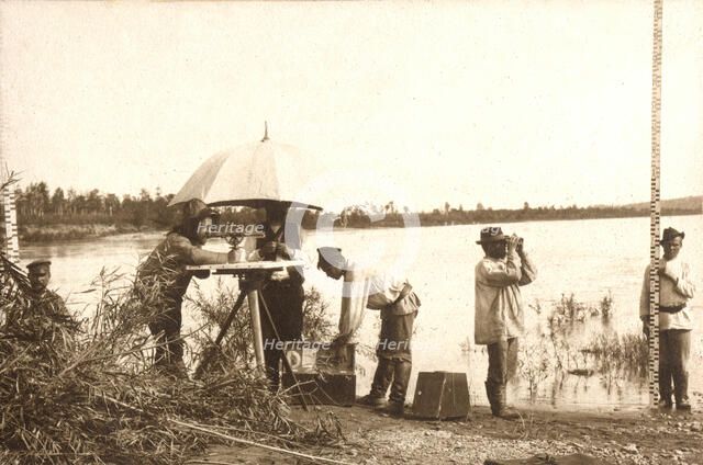 Carrying out a scale survey on the banks of the Zeya River, 1909. Creator: Vladimir Ivanovich Fedorov.