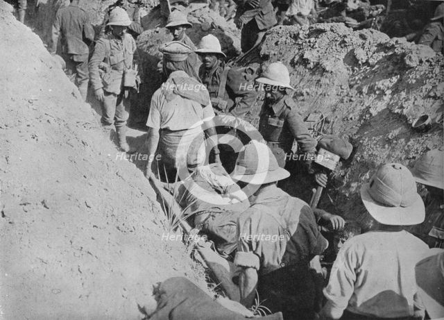 'Carrying wounded through the trenches', 1915. Artist: Unknown.